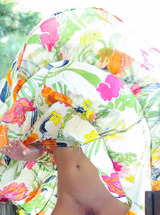 Gia Ren Pulling Down Her Floral Dress To Let The Sun Kiss Her Beautiful Breasts