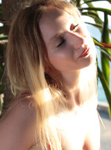 Annie Anne Teases Her Big Boobs And Firm Ass Under A Palm Tree With A Sheer Red Lingerie photo 08