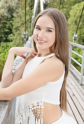 Sasha Quinn Smiling Playfully As Her Short Skirt Flips Up To Reveal She’s Not Wearing Panties