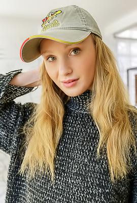 Dana Red With Strawberry-blonde Hair Lounging Naked In An Armchair