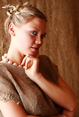 Elka Teases With Blue Eyes And Blonde Hair On A Rainy Afternoon