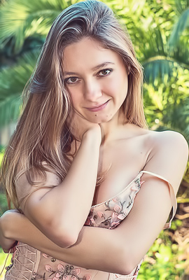 Isla Plays Peek-a-boo in a Tight Bodysuit at Sunset